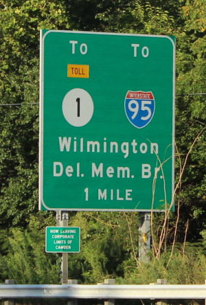 Sign in Camden, Delaware specifying route to Delaware Memorial Bridge